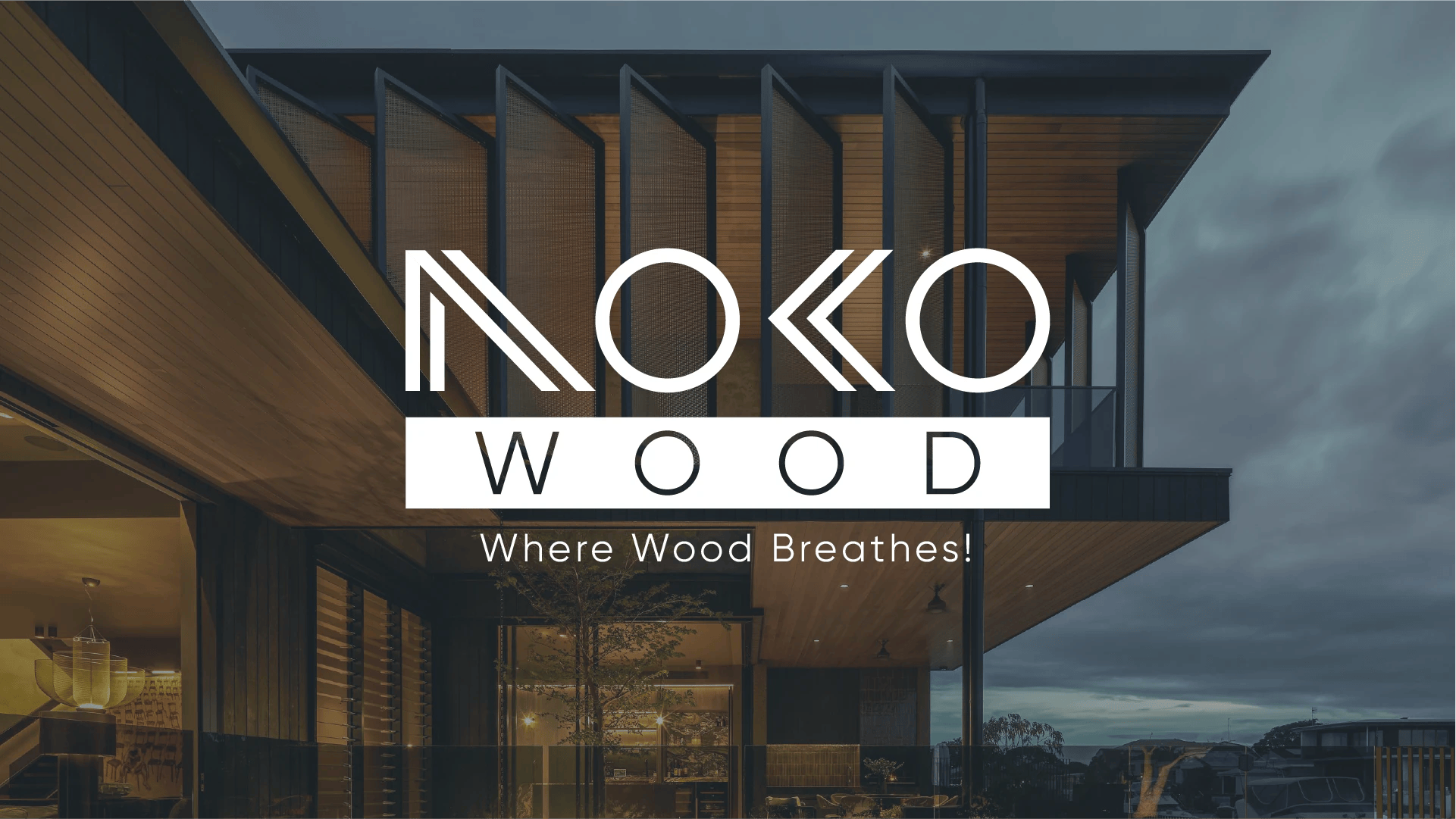 Noko Wood ahşap yapı markası için geometrik çizgilerle özelleştirilmiş beyaz Noko yazısı ve modern mimari bina görseli.